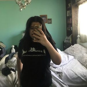 women’s black thrasher shirt